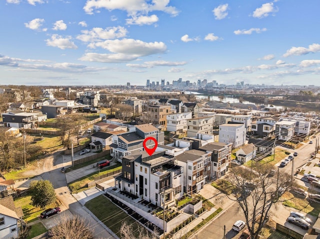 birds eye view of property with a city view