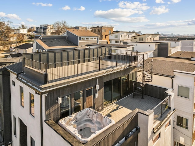 exterior space featuring a balcony and stucco siding