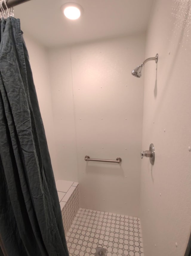 bathroom with curtained shower