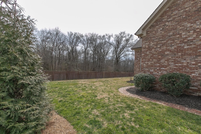 view of yard with fence