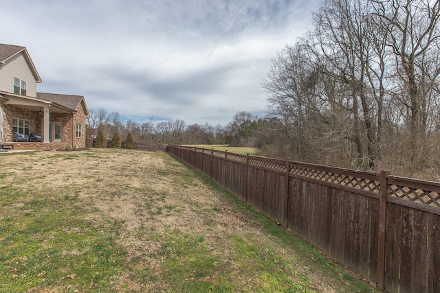 view of yard featuring a fenced backyard