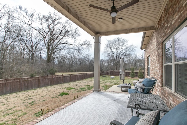 view of patio / terrace featuring a fenced backyard and ceiling fan