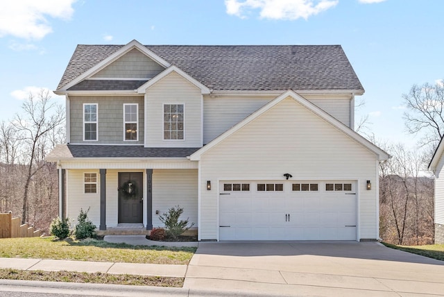 traditional home featuring a porch, a garage, driveway, and a shingled roof