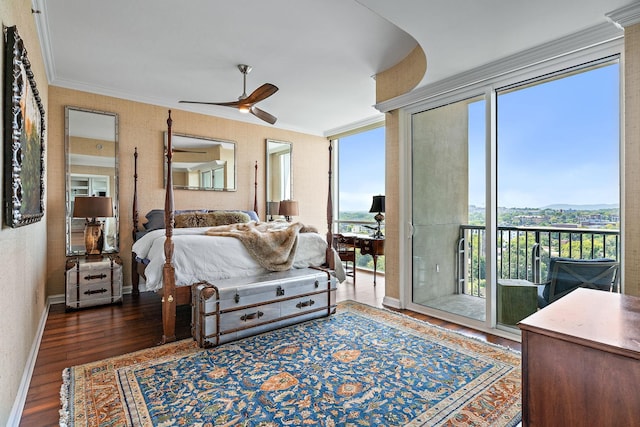 bedroom featuring wood finished floors, multiple windows, access to exterior, and ornamental molding