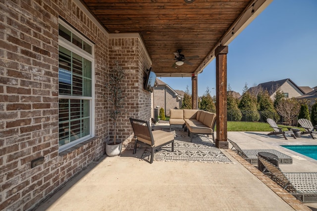 view of patio with a fenced in pool, an outdoor hangout area, ceiling fan, and fence