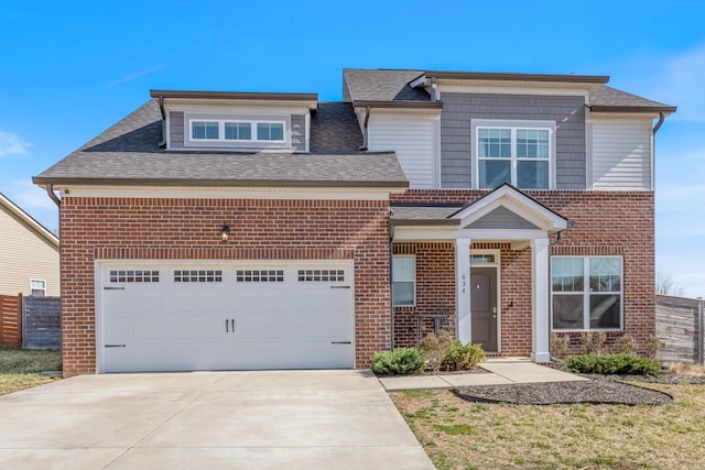 view of front facade with brick siding, an attached garage, and concrete driveway