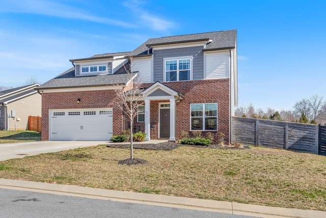 view of front facade with brick siding, fence, concrete driveway, a front yard, and a garage