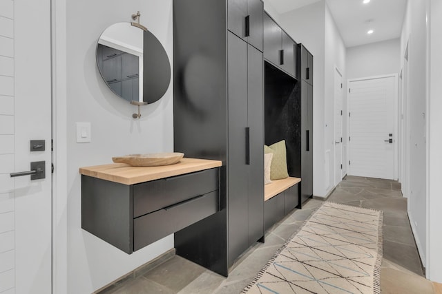 mudroom featuring recessed lighting