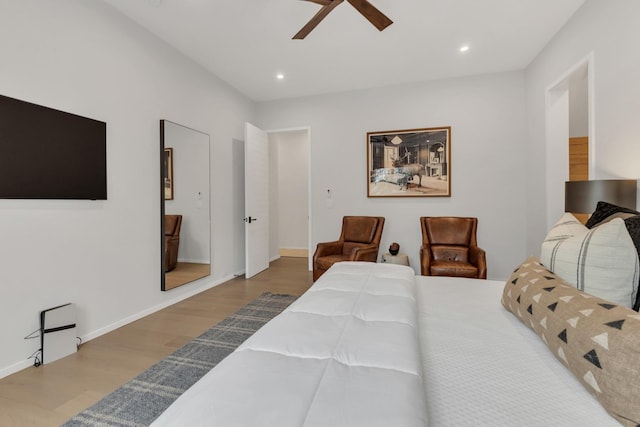 bedroom with recessed lighting, a ceiling fan, baseboards, and wood finished floors