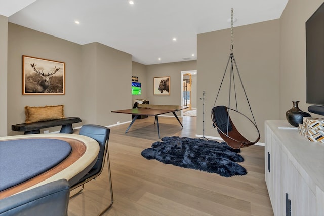 office with recessed lighting, baseboards, and light wood finished floors