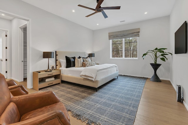 bedroom with visible vents, baseboards, recessed lighting, ceiling fan, and wood-type flooring