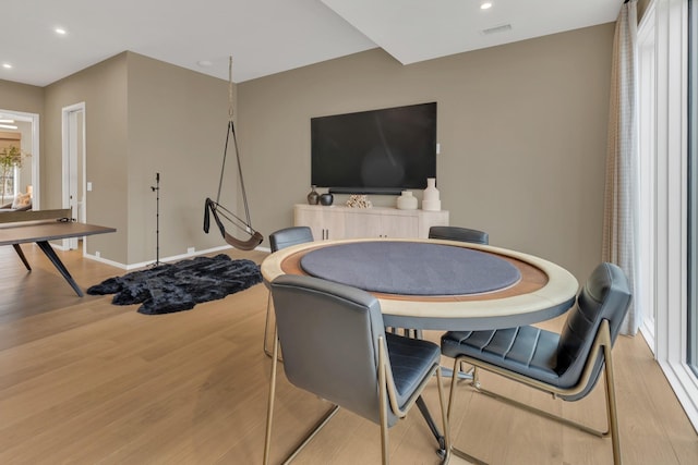 interior space featuring recessed lighting, visible vents, light wood finished floors, and baseboards