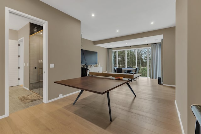 game room with recessed lighting, baseboards, and light wood-style flooring