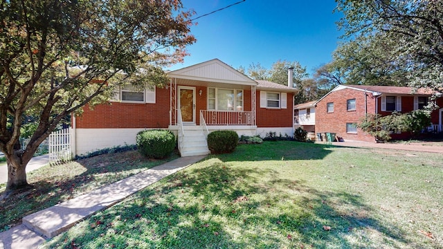 bungalow-style house with a porch, brick siding, and a front lawn