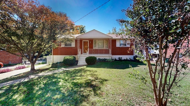 628 Truxton Ct, Nashville, TN 37214 - bungalow-style house featuring brick siding, a porch, and a front yard