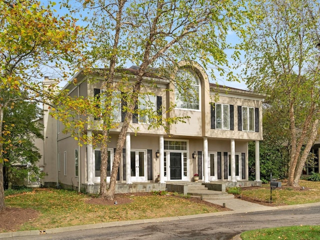 view of front of property featuring stucco siding