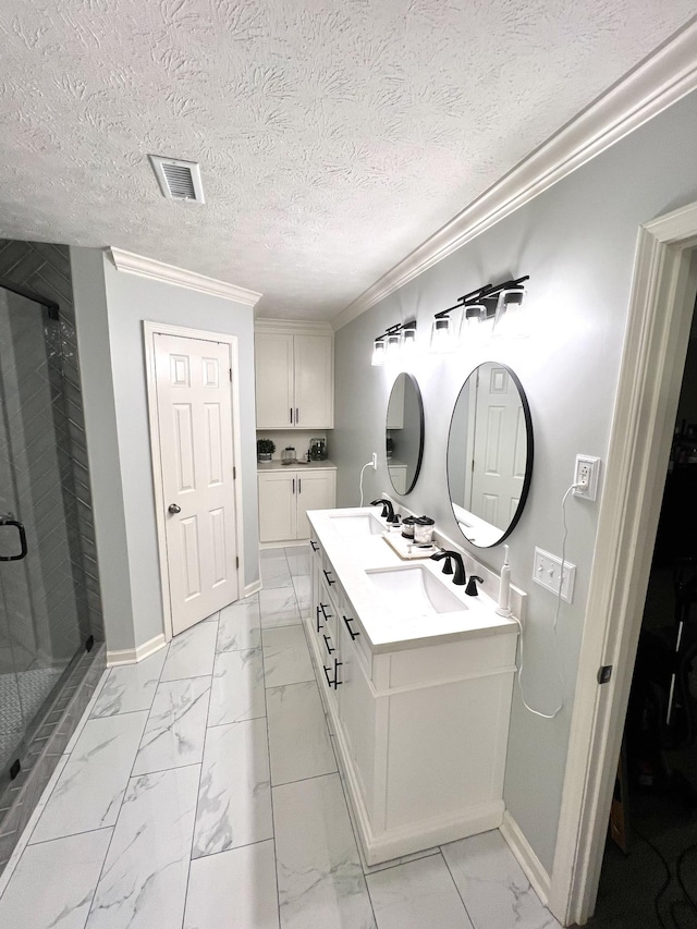 bathroom with baseboards, visible vents, a sink, a shower stall, and marble finish floor