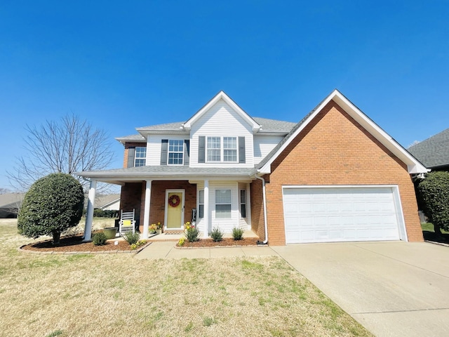 view of front of home with an attached garage, covered porch, a front lawn, concrete driveway, and brick siding