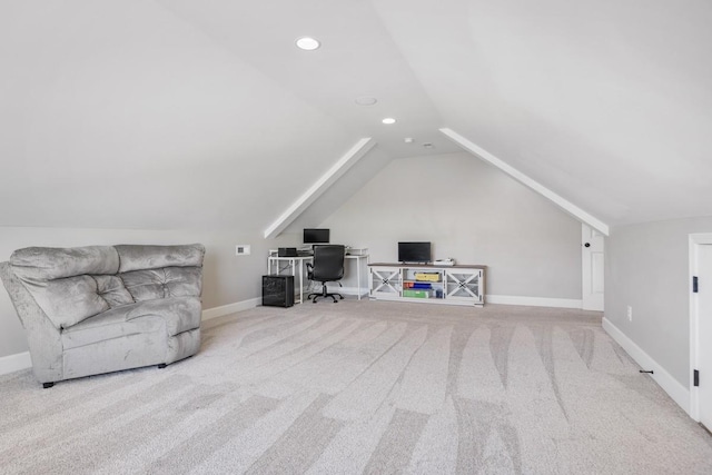 carpeted office space featuring vaulted ceiling, recessed lighting, and baseboards