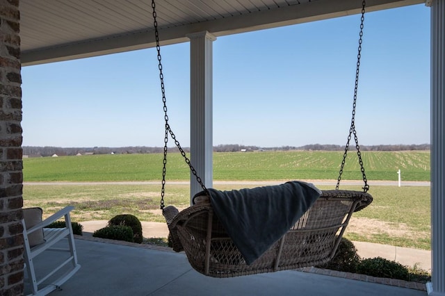 view of patio with a rural view