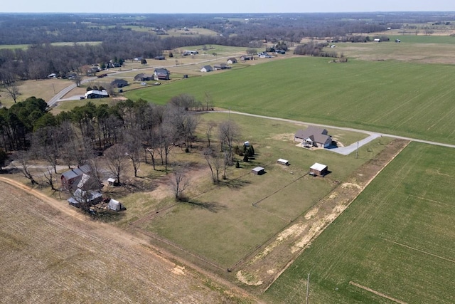 birds eye view of property featuring a rural view