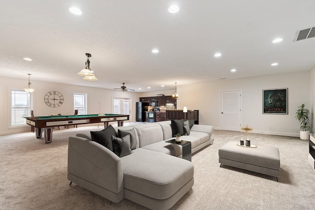living area with recessed lighting, plenty of natural light, light colored carpet, and pool table