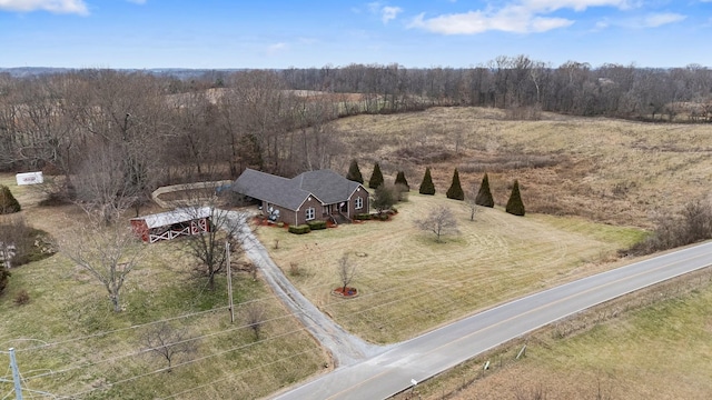 aerial view with a view of trees and a rural view