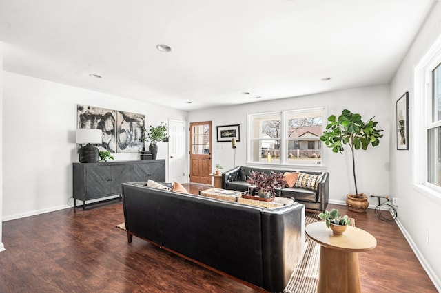 living area featuring recessed lighting, baseboards, and wood finished floors