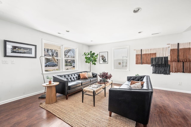 living area featuring recessed lighting, wood finished floors, and baseboards