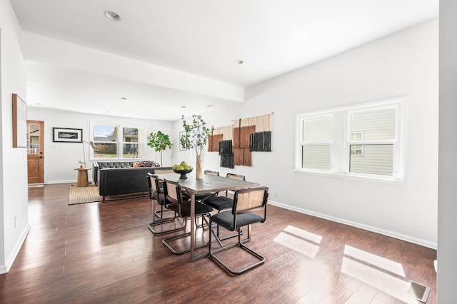 dining area with recessed lighting, baseboards, and wood finished floors