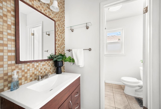 bathroom featuring visible vents, toilet, tile patterned flooring, decorative backsplash, and vanity