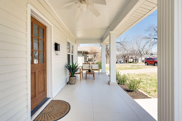 view of patio / terrace with a porch and ceiling fan