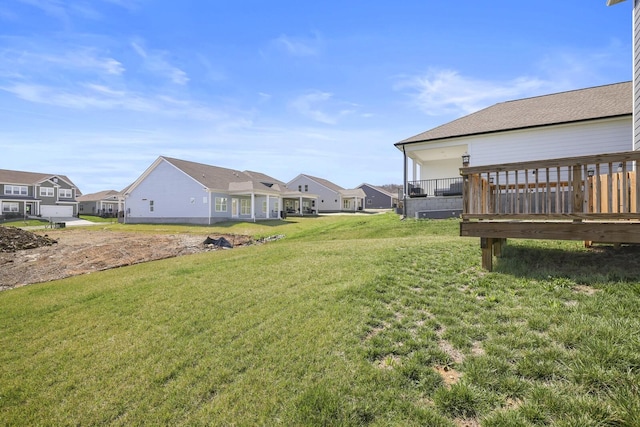 view of yard featuring a residential view
