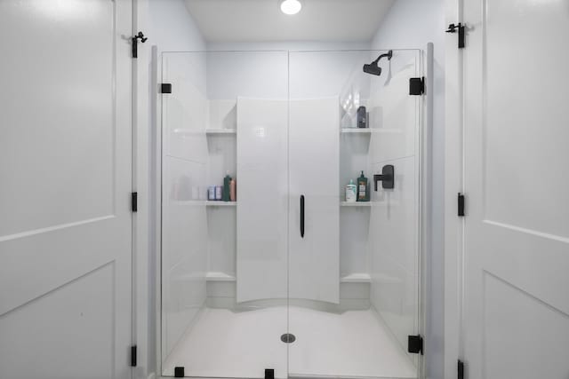 bathroom featuring a shower stall