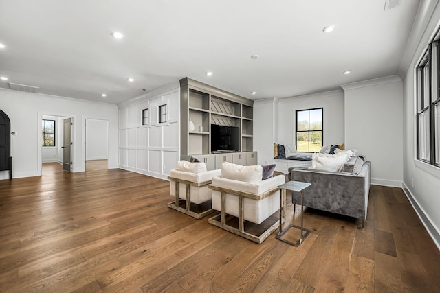 living room featuring recessed lighting, visible vents, dark wood-type flooring, and crown molding