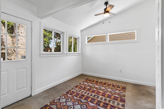 interior space featuring ceiling fan and vaulted ceiling