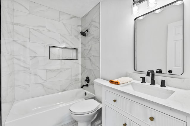 bathroom with toilet, shower / washtub combination, and vanity