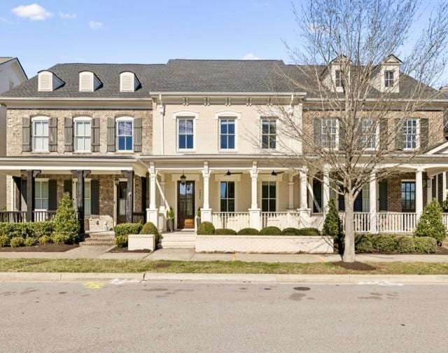 view of property with covered porch