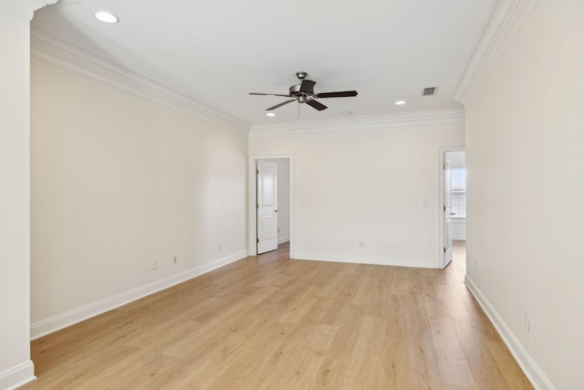 unfurnished room with light wood-style flooring, baseboards, crown molding, and a ceiling fan