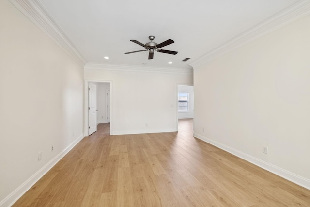 empty room with light wood finished floors, baseboards, ceiling fan, and ornamental molding