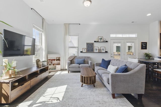 living room featuring recessed lighting and wood finished floors