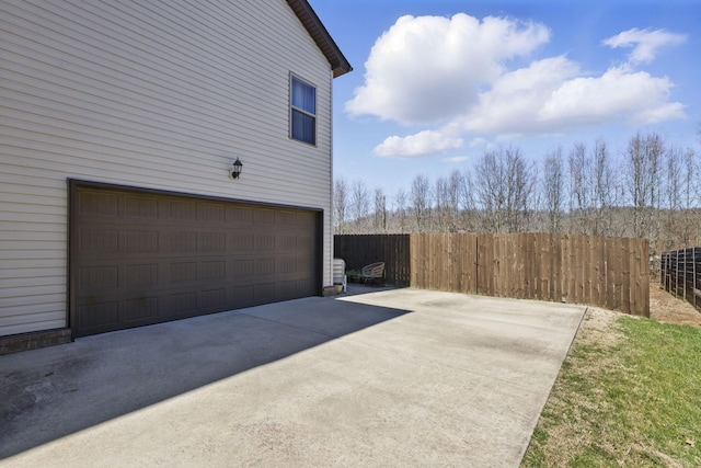 garage with fence