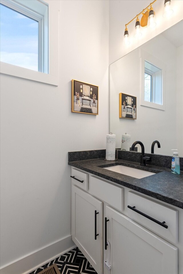 3018 Indiana Ave, Nashville, TN 37209 - bathroom with vanity and baseboards