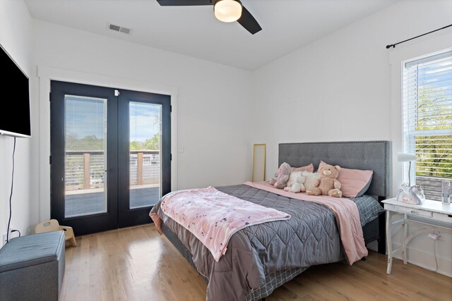 3018 Indiana Ave, Nashville, TN 37209 - bedroom featuring french doors, access to exterior, multiple windows, and light wood-style floors