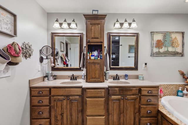 bathroom with a sink, a bath, and double vanity