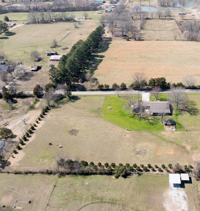 birds eye view of property featuring a rural view