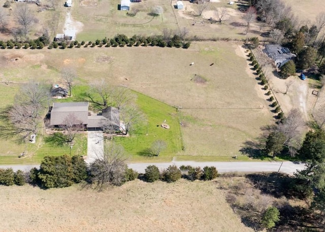 birds eye view of property featuring a rural view