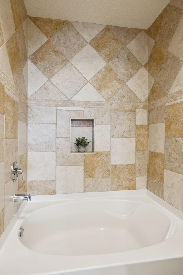 bathroom with a bathing tub