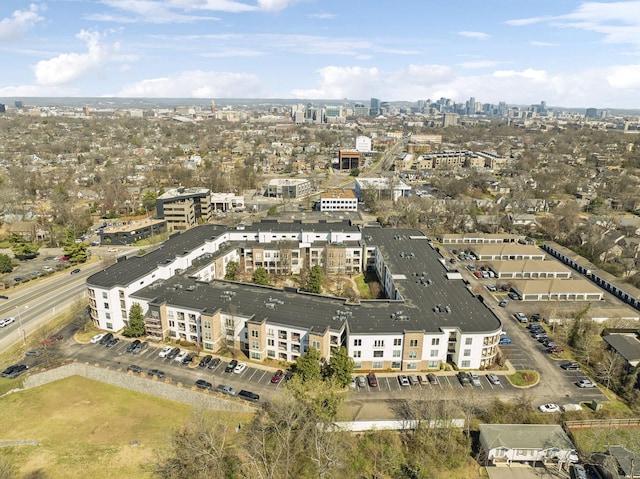 drone / aerial view featuring a city view