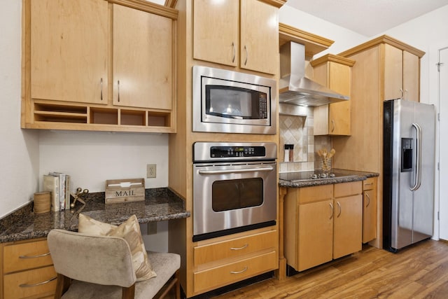 kitchen with wood finished floors, open shelves, stainless steel appliances, decorative backsplash, and wall chimney exhaust hood